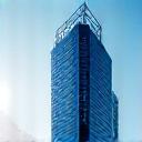 Modern commercial building entrance with 'Commercial Real Estate' signage